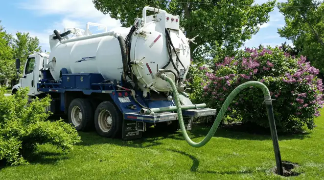 Professional vacuum truck performing residential drainage and septic maintenance in Irvine, CA